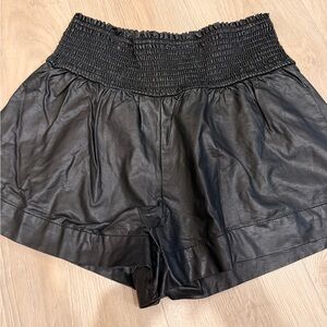 Black faux leather shorts, size small